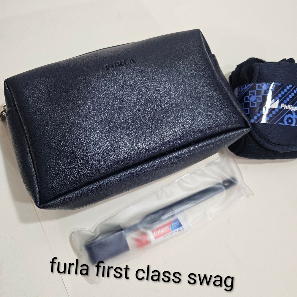 FURLA Phillippine Airline swag bag Has Socks and Tooth Brush Set NWOT